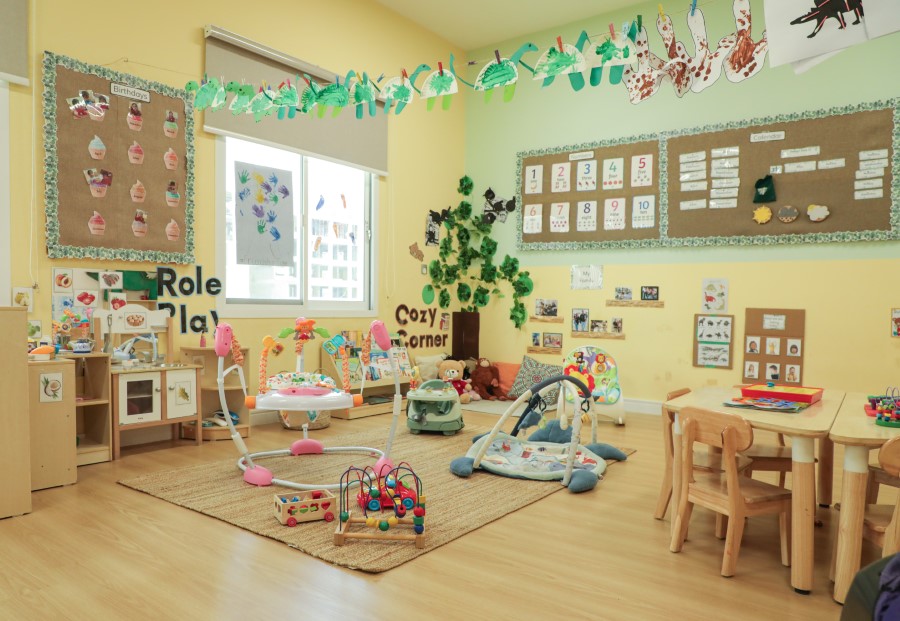 Nursery room with cozy corner and role-play